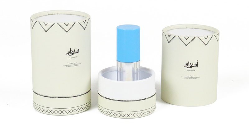 Custom round fragrance packaging with intricate Middle Eastern patterns